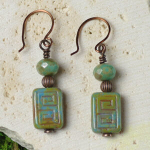 Petite earrings featuring a Greek key or meander design.